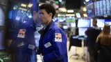 Wall Street évolue en baisse, attend un signe de la Fed