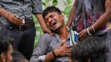 Les secours passent le site du crash du Boeing d'Air India au peigne fin