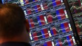 Wall Street termine sans direction claire, digère la baisse des taux de la Fed