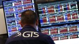 Wall Street termine en ordre dispersé, entre budget américain et indicateurs