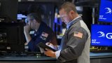 Wall Street ouvre en hausse, les résultats d'entreprises en ligne de mire