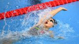 Mondiaux de natation: le phénomène chinois Yu Zidi, 12 ans, saute dans le grand bain