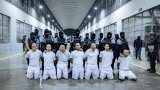 Les avocats des Vénézuéliens expulsés vers une prison du Salvador face à un mur
