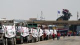 À l’entrée de Gaza, des centaines de camions humanitaires bloqués et une aide au compte-gouttes