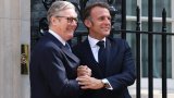 Accord franco-britannique sur un échange de migrants au dernier jour de la visite d'Etat de Macron