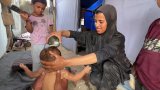Bande de Gaza : sous la tente dans une chaleur intense